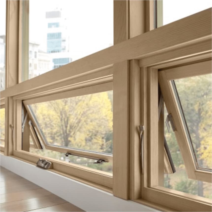 Group of floor-level awning windows in an apartment