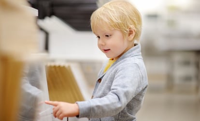 little boy choosing replacement windows for home.jpg