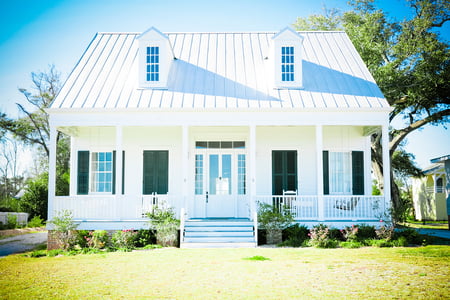 metal roof on white cottage