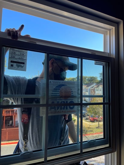 man working on windows