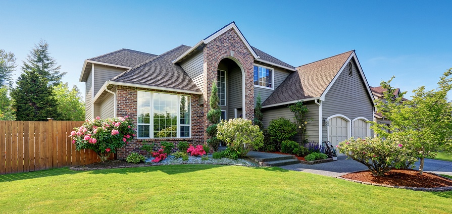 beautiful home with siding 