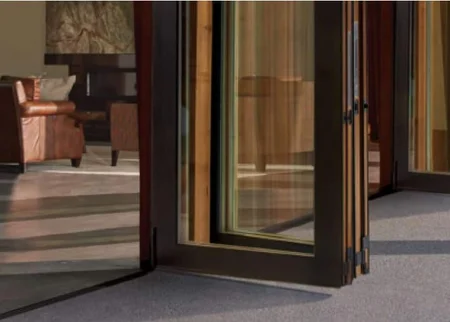 Large glass bi-fold patio door open to outdoor space