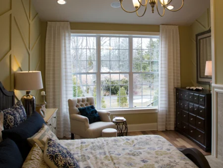 Single and double‑hung windows in bright living room